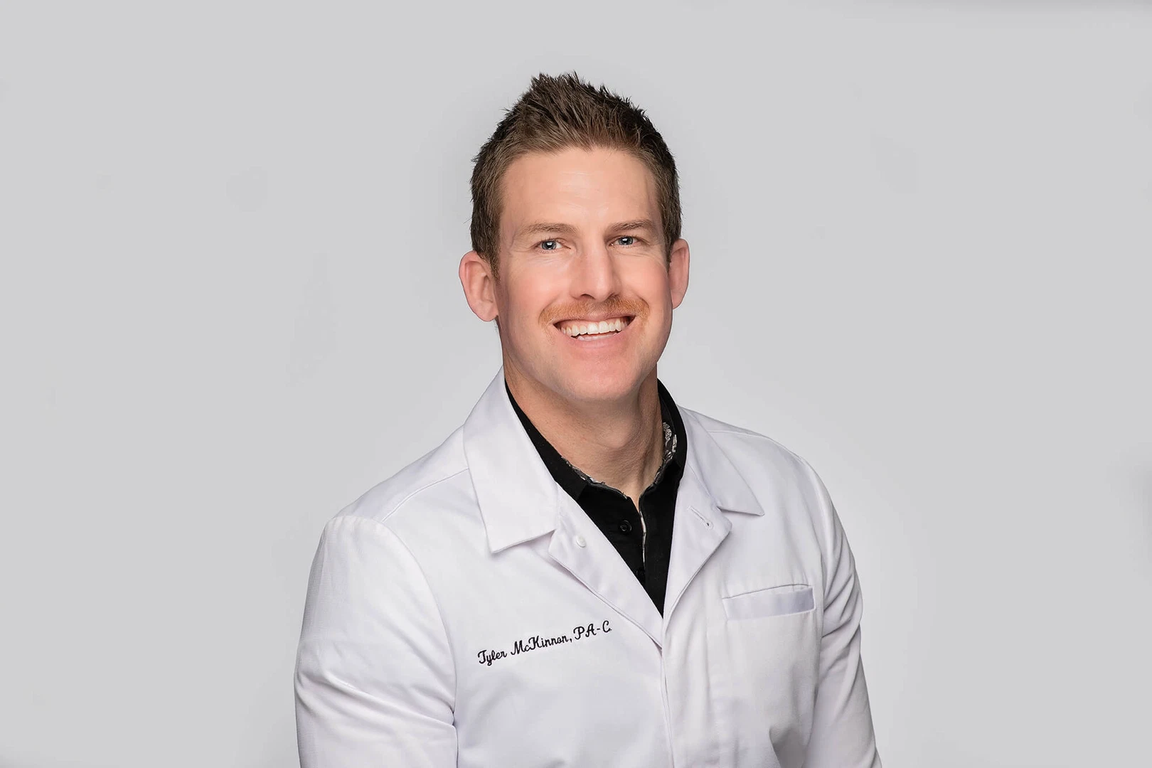 Tyler McKinnon, PA-C, MPAS, at Dermatology West in Farr West, Utah.